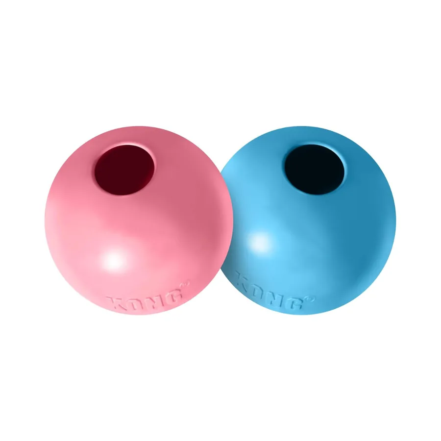 Deux balles Kong Puppy en caoutchouc souple, rose et bleue, percées d'une ouverture à garnir